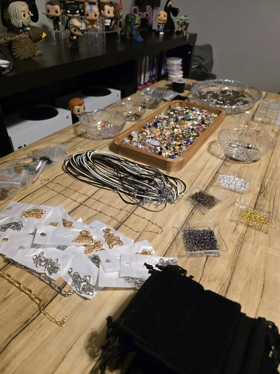 Charms, cording and clasps laid out for a workshop
